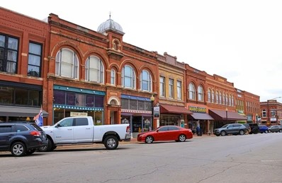 Historic downtown commercial district with brick storefronts and businesses